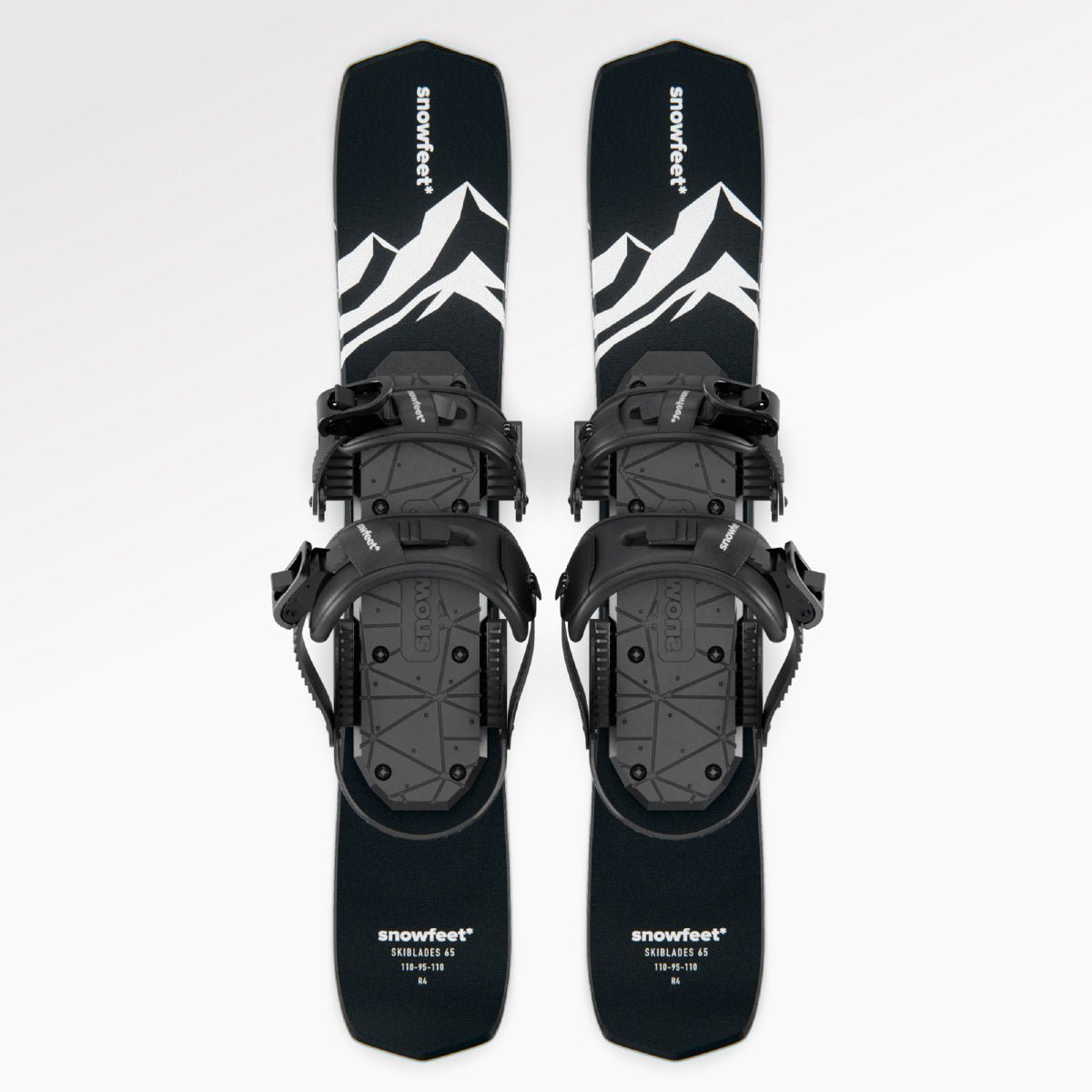 Skiboards Snowblades Short Mini Skis - snowfeet*, Product photo, wood core skis, snowboard binding, black mountain color.