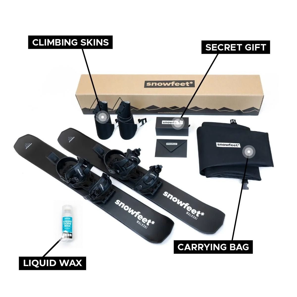 Snowfeet walkski unboxed photo. Wood core version. Equipment set with climbing skins, hard wax, carrying bag, and branded box on a white background.