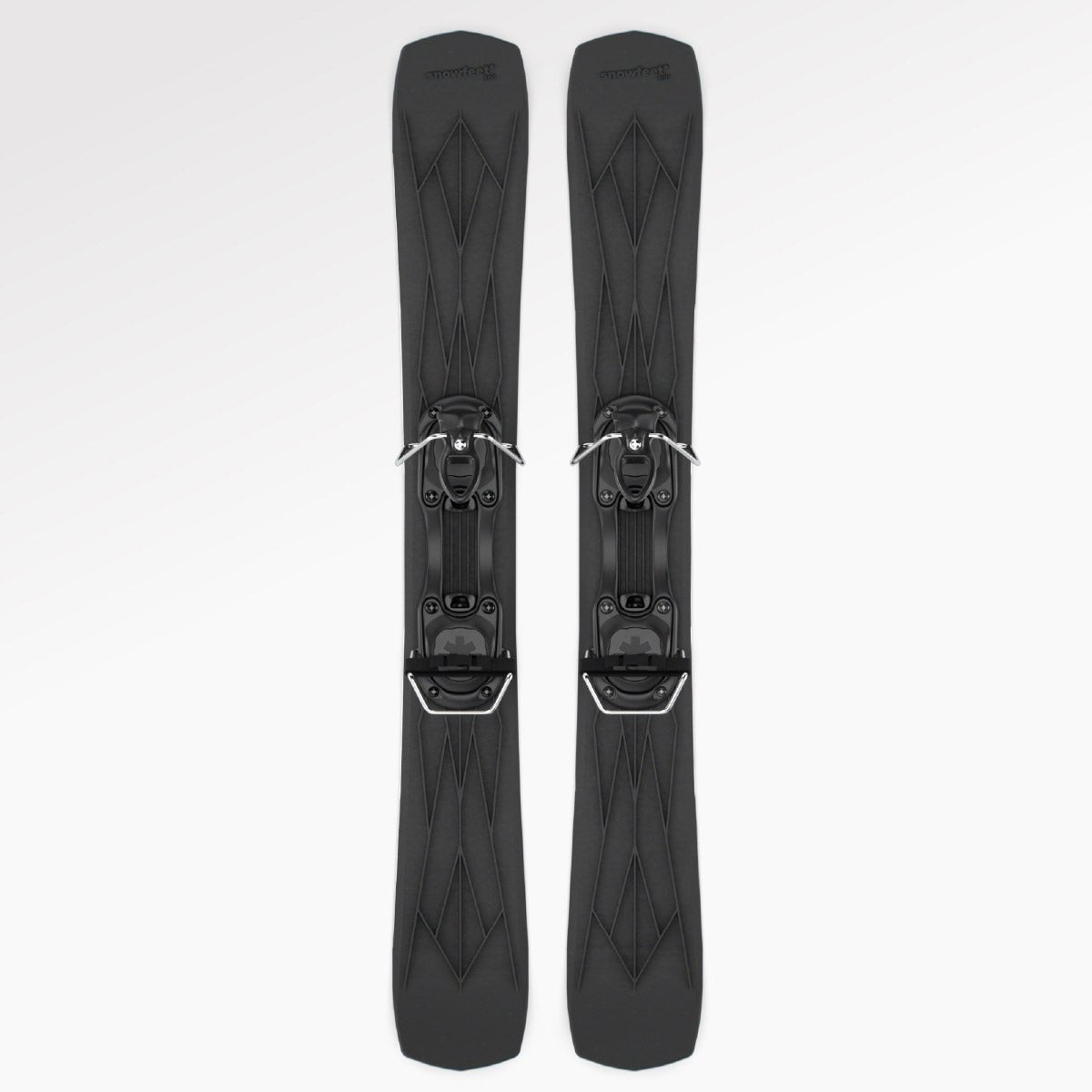 Pair of black skis with bindings on a white background
