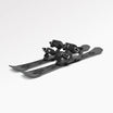 Pair of black short skis Snowfeet with snowboard bindings on a white background