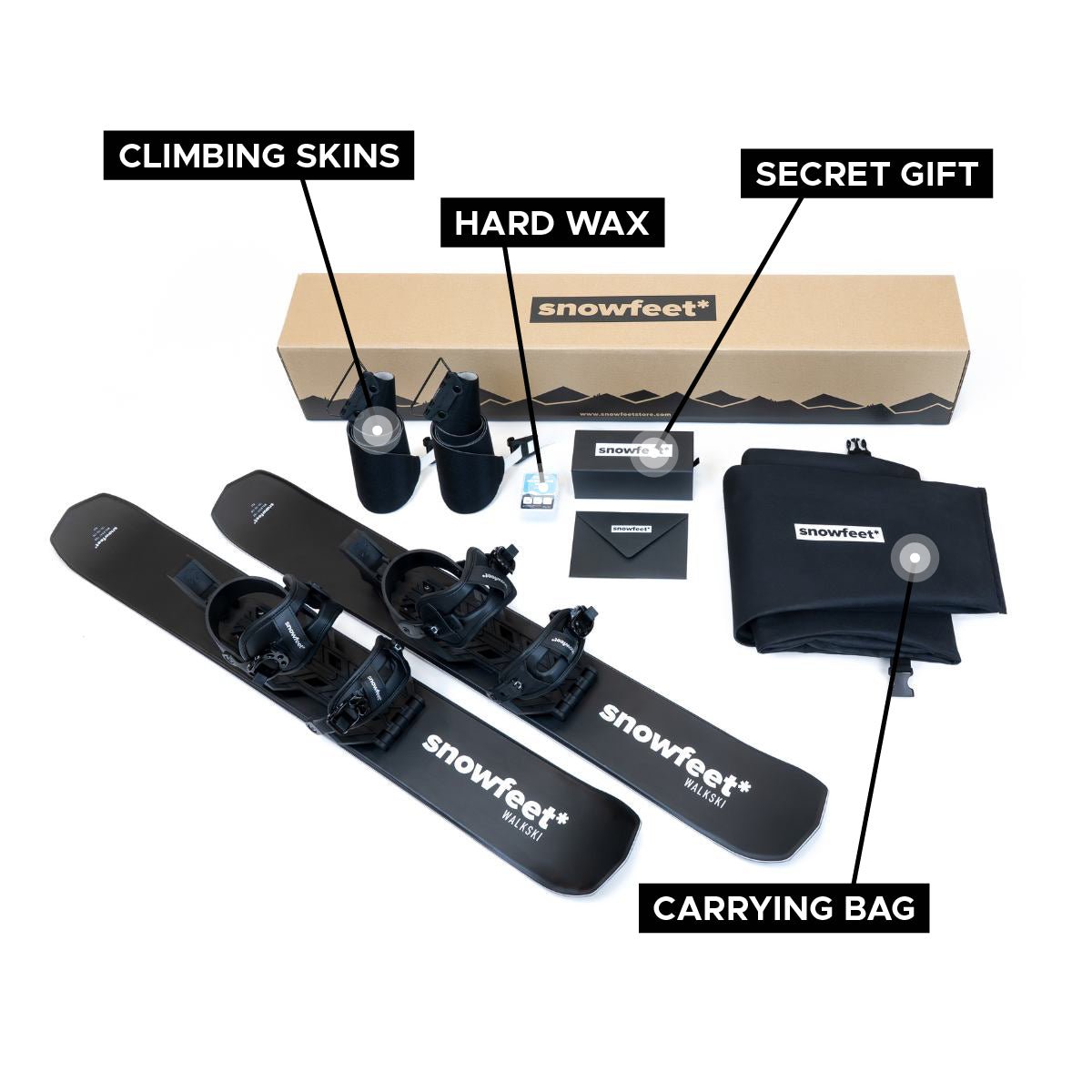 Snowfeet walkski unboxed photo. Wood core version. Equipment set with climbing skins, hard wax, carrying bag, and branded box on a white background.