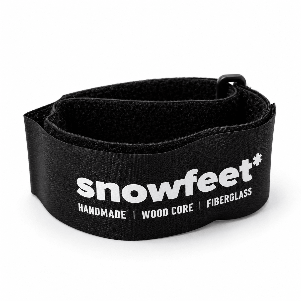 A black snowboard binding strap with white printed text reading 'snowfeet*' and 'HANDMADE | WOOD CORE | FIBERGLASS' on a white background.
