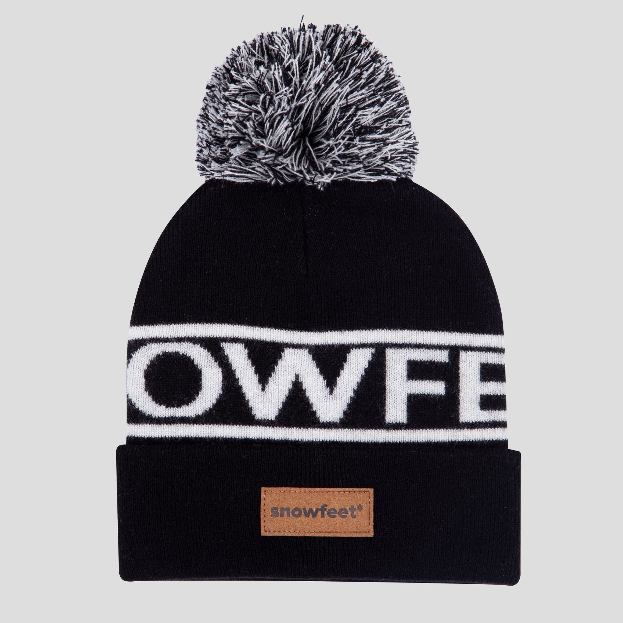 snowfeet* ロゴ入り ウィンター ニット帽 | ビーニーブラック。 100% メリノウール。 スタンダードフィット。